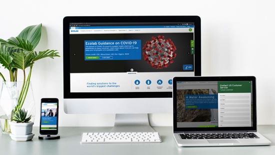 Screenshots of Ecolab's website shown on desktop computer, laptop computer, and cellphone.